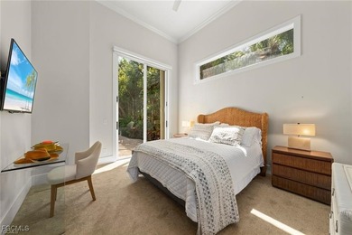 Experience the perfect blend of spacious luxury and serene on The Sanctuary Golf Club in Florida - for sale on GolfHomes.com, golf home, golf lot