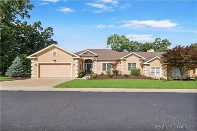 Live the maintenance-free dream in Porto Cima! This beautifully on The Club At Porto Cima in Missouri - for sale on GolfHomes.com, golf home, golf lot