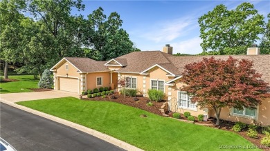 Live the maintenance-free dream in Porto Cima! This beautifully on The Club At Porto Cima in Missouri - for sale on GolfHomes.com, golf home, golf lot