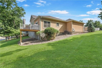 Live the maintenance-free dream in Porto Cima! This beautifully on The Club At Porto Cima in Missouri - for sale on GolfHomes.com, golf home, golf lot
