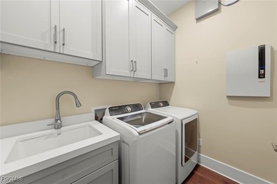 Experience the perfect blend of spacious luxury and serene on The Sanctuary Golf Club in Florida - for sale on GolfHomes.com, golf home, golf lot