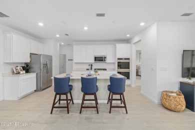 Bring your golf clubs! Experience luxury living in this gorgeous on Cimarrone Golf and Country Club in Florida - for sale on GolfHomes.com, golf home, golf lot