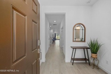 Bring your golf clubs! Experience luxury living in this gorgeous on Cimarrone Golf and Country Club in Florida - for sale on GolfHomes.com, golf home, golf lot