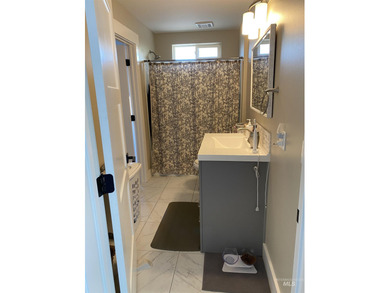 This home has it all! 5 Bedrooms, spacious master has a standing on Eagle Hills Golf Course in Idaho - for sale on GolfHomes.com, golf home, golf lot