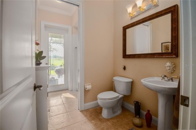 Welcome to your dream home, located on the 9th hole in the on The Club at Eaglebrooke in Florida - for sale on GolfHomes.com, golf home, golf lot