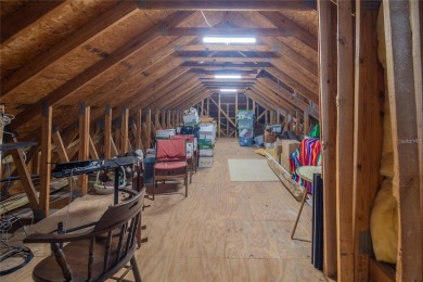 Welcome to your dream home, located on the 9th hole in the on The Club at Eaglebrooke in Florida - for sale on GolfHomes.com, golf home, golf lot