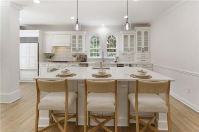 Step into refined elegance and exceptional design in this fully on The Golf Club of Georgia in Georgia - for sale on GolfHomes.com, golf home, golf lot