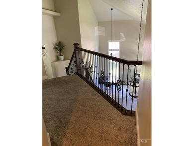 This home has it all! 5 Bedrooms, spacious master has a standing on Eagle Hills Golf Course in ID - for sale on GolfHomes.com, golf home, golf lot