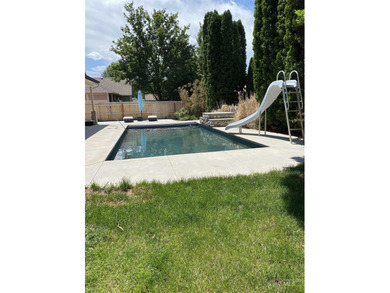 This home has it all! 5 Bedrooms, spacious master has a standing on Eagle Hills Golf Course in ID - for sale on GolfHomes.com, golf home, golf lot