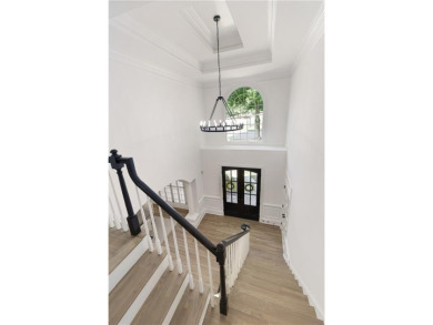 Step into refined elegance and exceptional design in this fully on The Golf Club of Georgia in Georgia - for sale on GolfHomes.com, golf home, golf lot