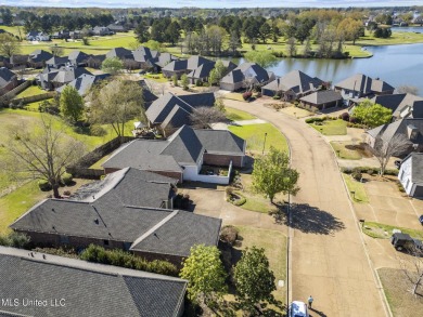 Welcome to this beautiful home located in the highly sought on Lake Caroline Golf Club in Mississippi - for sale on GolfHomes.com, golf home, golf lot