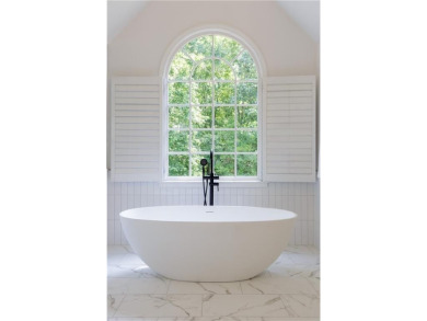 Step into refined elegance and exceptional design in this fully on The Golf Club of Georgia in Georgia - for sale on GolfHomes.com, golf home, golf lot