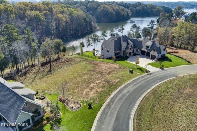 Enjoy lakeside living with this gently sloping waterfront lot on on Wind River Golf Course in Tennessee - for sale on GolfHomes.com, golf home, golf lot