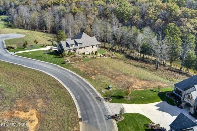 Enjoy lakeside living with this gently sloping waterfront lot on on Wind River Golf Course in Tennessee - for sale on GolfHomes.com, golf home, golf lot