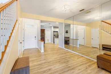 Wake up each morning to peaceful golf course views in this on East Bay Golf Club in Florida - for sale on GolfHomes.com, golf home, golf lot