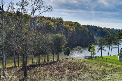 Enjoy lakeside living with this gently sloping waterfront lot on on Wind River Golf Course in Tennessee - for sale on GolfHomes.com, golf home, golf lot