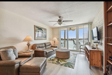 Under contract-accepting backup offers. Experience Florida on Isla Del Sol Yacht and Country Club in Florida - for sale on GolfHomes.com, golf home, golf lot