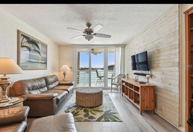 Under contract-accepting backup offers. Experience Florida on Isla Del Sol Yacht and Country Club in Florida - for sale on GolfHomes.com, golf home, golf lot