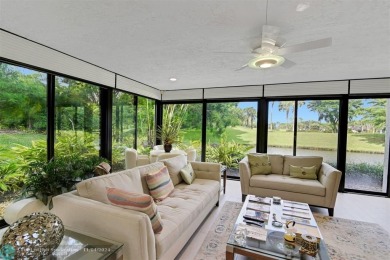 RESORT STYLE LIVING.  THIS RARELY AVAILABLE REMODELED VILLA WITH on Boca West Golf and Country Club in Florida - for sale on GolfHomes.com, golf home, golf lot