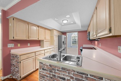 Located in the sought-after gated community of Fairfield Harbour on Harbour Point Golf Club in North Carolina - for sale on GolfHomes.com, golf home, golf lot