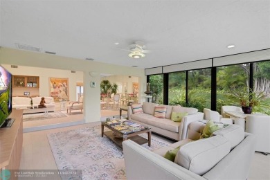 RESORT STYLE LIVING.  THIS RARELY AVAILABLE REMODELED VILLA WITH on Boca West Golf and Country Club in Florida - for sale on GolfHomes.com, golf home, golf lot