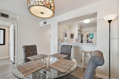 Under contract-accepting backup offers. Experience Florida on Isla Del Sol Yacht and Country Club in Florida - for sale on GolfHomes.com, golf home, golf lot