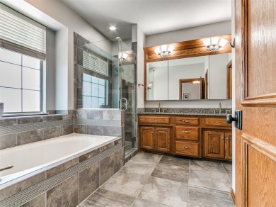 Elegant Home in Gated Golf Course Community with Backyard Oasis! on Fairfax Golf Club in Oklahoma - for sale on GolfHomes.com, golf home, golf lot
