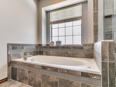 Elegant Home in Gated Golf Course Community with Backyard Oasis! on Fairfax Golf Club in Oklahoma - for sale on GolfHomes.com, golf home, golf lot