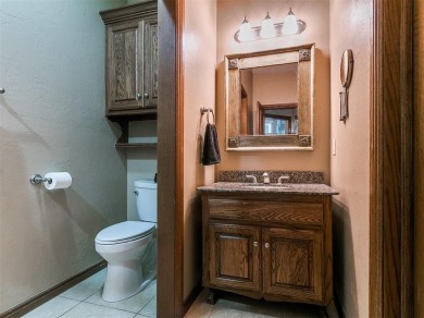 Elegant Home in Gated Golf Course Community with Backyard Oasis! on Fairfax Golf Club in Oklahoma - for sale on GolfHomes.com, golf home, golf lot