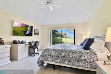 RESORT STYLE LIVING.  THIS RARELY AVAILABLE REMODELED VILLA WITH on Boca West Golf and Country Club in Florida - for sale on GolfHomes.com, golf home, golf lot