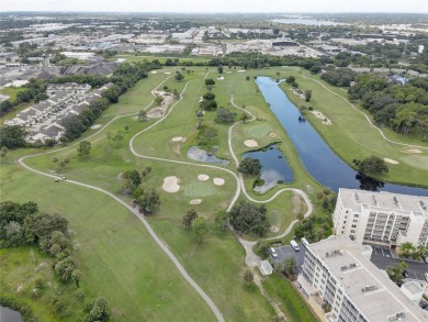 Welcome to your dream home! This stunning top-floor condominium on East Bay Golf Club in Florida - for sale on GolfHomes.com, golf home, golf lot