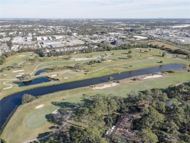 Welcome to your dream home! This stunning top-floor condominium on East Bay Golf Club in Florida - for sale on GolfHomes.com, golf home, golf lot