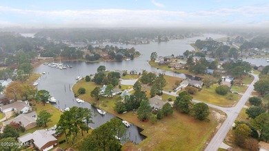 Located in the sought-after gated community of Fairfield Harbour on Harbour Point Golf Club in North Carolina - for sale on GolfHomes.com, golf home, golf lot