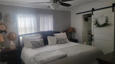 This canal home has the *WOW* factor! Top tier decorated that on Pelicans Nest Golf Club in Florida - for sale on GolfHomes.com, golf home, golf lot