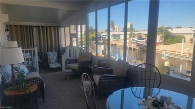 This canal home has the *WOW* factor! Top tier decorated that on Pelicans Nest Golf Club in Florida - for sale on GolfHomes.com, golf home, golf lot