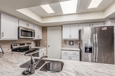 Welcome to your next home in Ahwatukee, where sun-soaked days on Ahwatukee Country Club in Arizona - for sale on GolfHomes.com, golf home, golf lot