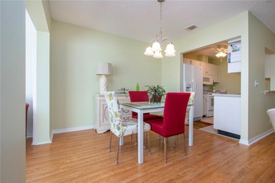 Welcome home to this bright and beautiful EXPANDED Hampton model on Falcon Watch Golf Club in Florida - for sale on GolfHomes.com, golf home, golf lot