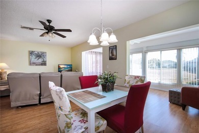 Welcome home to this bright and beautiful EXPANDED Hampton model on Falcon Watch Golf Club in Florida - for sale on GolfHomes.com, golf home, golf lot