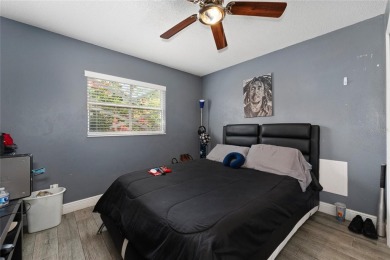 This beautifully maintained home features 4-bedrooms, 2.5-baths on Rio Pinar Golf and Country Club in Florida - for sale on GolfHomes.com, golf home, golf lot