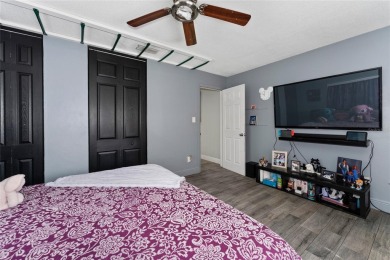 This beautifully maintained home features 4-bedrooms, 2.5-baths on Rio Pinar Golf and Country Club in Florida - for sale on GolfHomes.com, golf home, golf lot