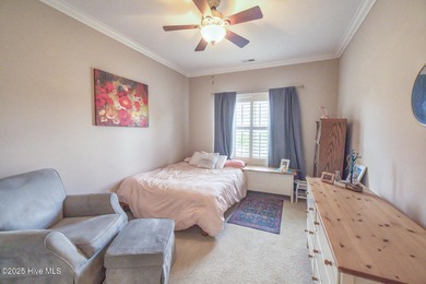 Welcome to effortless, single-level living in the highly on Cape Fear National At Brunswick Forest in North Carolina - for sale on GolfHomes.com, golf home, golf lot