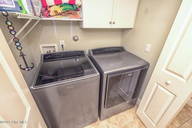 Welcome to effortless, single-level living in the highly on Cape Fear National At Brunswick Forest in North Carolina - for sale on GolfHomes.com, golf home, golf lot