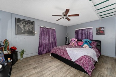 This beautifully maintained home features 4-bedrooms, 2.5-baths on Rio Pinar Golf and Country Club in Florida - for sale on GolfHomes.com, golf home, golf lot