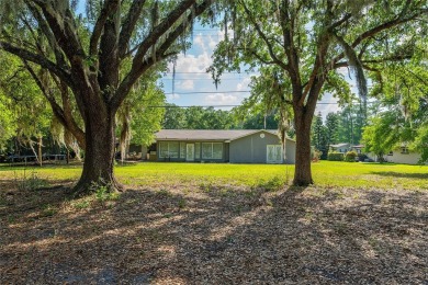 This beautifully maintained home features 4-bedrooms, 2.5-baths on Rio Pinar Golf and Country Club in Florida - for sale on GolfHomes.com, golf home, golf lot