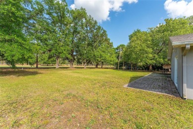 This beautifully maintained home features 4-bedrooms, 2.5-baths on Rio Pinar Golf and Country Club in Florida - for sale on GolfHomes.com, golf home, golf lot