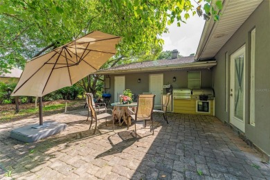 This beautifully maintained home features 4-bedrooms, 2.5-baths on Rio Pinar Golf and Country Club in Florida - for sale on GolfHomes.com, golf home, golf lot
