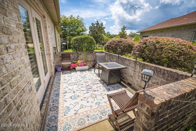 Welcome to effortless, single-level living in the highly on Cape Fear National At Brunswick Forest in North Carolina - for sale on GolfHomes.com, golf home, golf lot