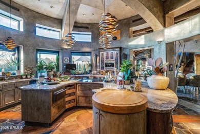 This stunning custom home, designed by renowned architect Shelby on The Boulders Resort Golf Club in Arizona - for sale on GolfHomes.com, golf home, golf lot
