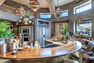 This stunning custom home, designed by renowned architect Shelby on The Boulders Resort Golf Club in Arizona - for sale on GolfHomes.com, golf home, golf lot