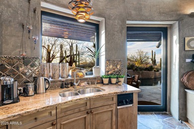 This stunning custom home, designed by renowned architect Shelby on The Boulders Resort Golf Club in Arizona - for sale on GolfHomes.com, golf home, golf lot